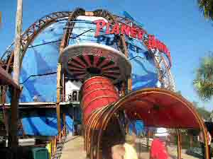 Construction companies built Downtown Disney in the 1980s and 1990s, featuring showcase commercial buildings like this Planet Hollywood globe structure.