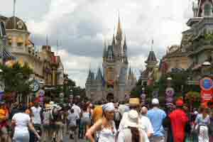 The Magic Kingdom was constructed in the same wheel-shaped configuration first employed at Disneyland. A long entrance through Mainstreet U.S.A. leads visitors into the park, to the center hub of the wheel where Cinderella's Castle stands. Winding "spokes" meandered from the castle through the rest of the park, leading visitors to six different themed "lands", including: Main Street, U.S.A.; Adventureland; Frontierland; Liberty Square; Fantasyland; and Tomorrowland. This brilliant design and construction of a theme park has been used by most theme parks built since the 1950s.